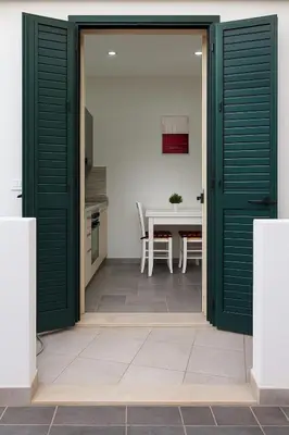 Cucina o angolo cottura di Le Arcada - Appartamenti nel cuore del centro storico di Orosei