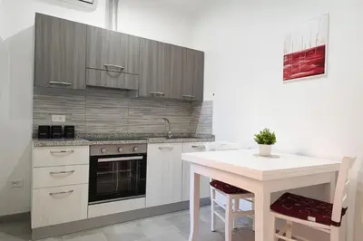 Cucina o angolo cottura di Le Arcada - Appartamenti nel cuore del centro storico di Orosei