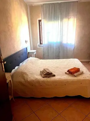 Letto o letti in una camera di Santa maria