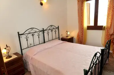 Letto o letti in una camera di villa i ginepri