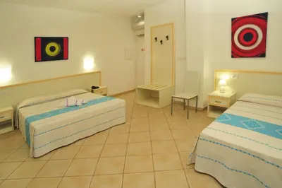 Letto o letti in una camera di Hotel Stella Marina