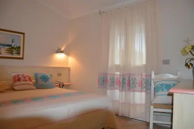 Letto o letti in una camera di Hotel La Palma