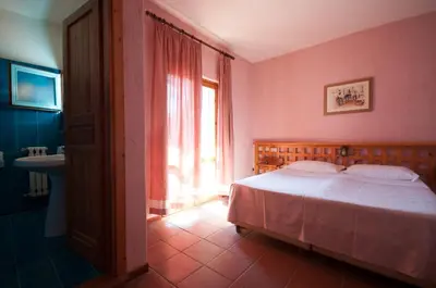 Letto o letti in una camera di Hotel Scintilla