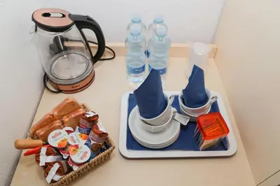 Set per la preparazione di tè e caffè presso Olbia Domus Inn