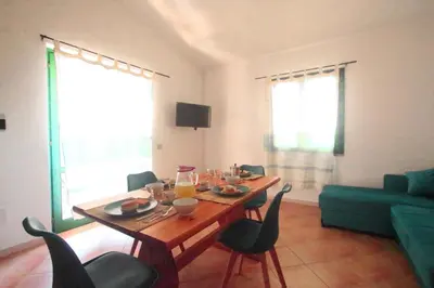 TV o dispositivi per l'intrattenimento presso Residence La Funtana