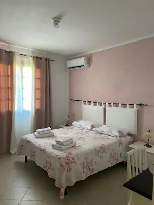 Letto o letti in una camera di La Villetta