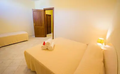 Letto o letti in una camera di Le Residenze di Vico Friuli 1