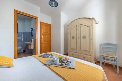 Letto o letti in una camera di Casa Mediterraneo