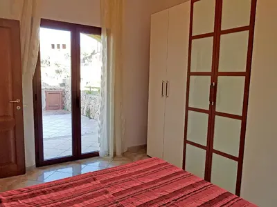 Letto o letti in una camera di villette baia