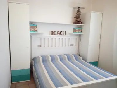 Letto o letti in una camera di Villino Asfodeli