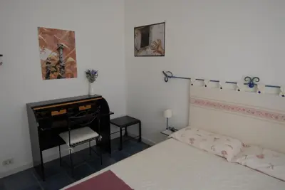 Letto o letti in una camera di Nughe 'e' Oro Guesthouse