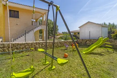 Area giochi per bambini di Le Case di Maiorca CAV - PMS CaseVacanze