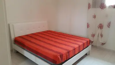 Letto o letti in una camera di Casa Carla