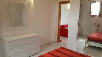 Letto o letti in una camera di Casa Carla