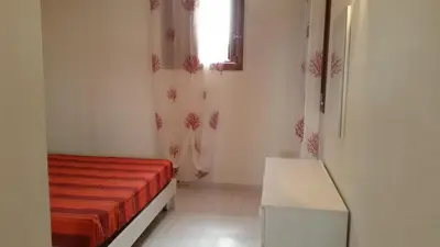 Letto o letti in una camera di Casa Carla