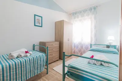 Letto o letti in una camera di White Rose Suite Apartment