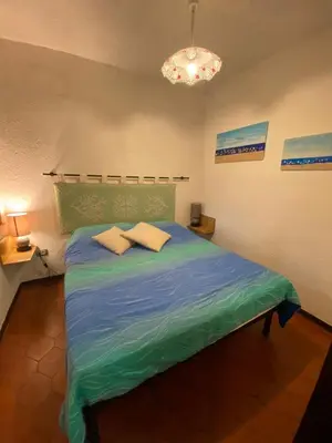 Letto o letti in una camera di Bilocale al Villaggio degli ulivi SAN TEODORO