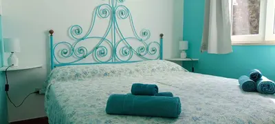 Letto o letti in una camera di Appartamento Sole