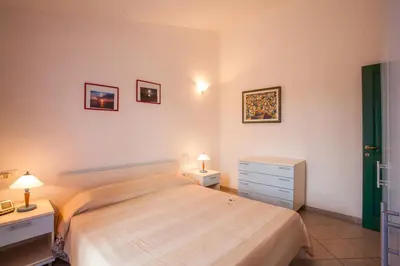 Letto o letti in una camera di Maestrale Flat - Klodge