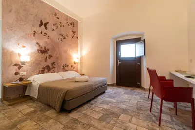 Letto o letti in una camera di Karama