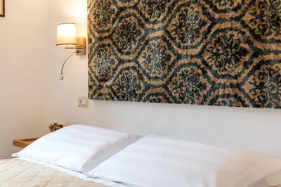 Letto o letti in una camera di Karama