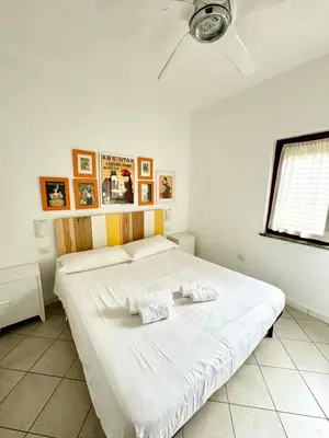Letto o letti in una camera di Trilocale climatizzato con cortile