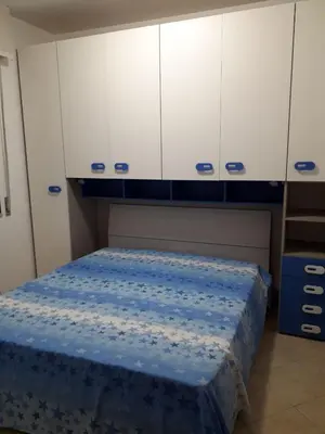 Letto o letti in una camera di domus pandora