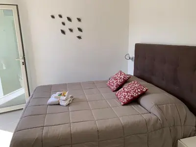 Letto o letti in una camera di B&B Somiar