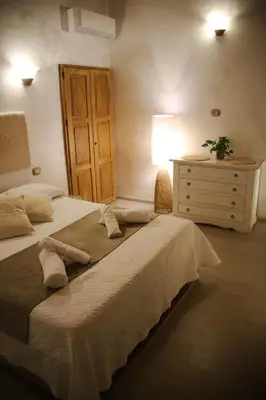 Letto o letti in una camera di Villa Agostina