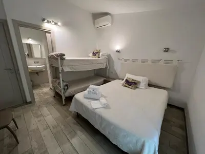 Letto o letti in una camera di In campagna da Nino