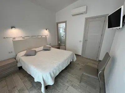 Letto o letti in una camera di In campagna da Nino