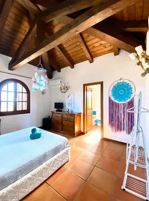 Letto o letti in una camera di Villa Acchiappasogni