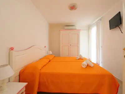 Letto o letti in una camera di Holiday Home Iris by Interhome