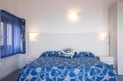 Letto o letti in una camera di Hotel La Playa