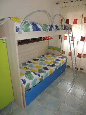 Letto o letti in una camera di Casa sulla spiaggia