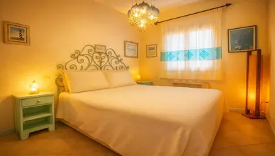 Letto o letti in una camera di Appartamento Mare Sardegna Murta Maria - Olbia