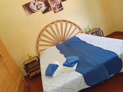 Letto o letti in una camera di Mare blu