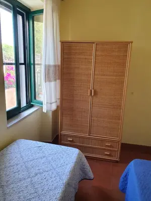 Letto o letti in una camera di Mare blu