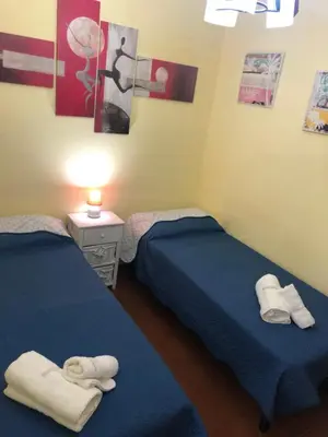 Letto o letti in una camera di Mare blu
