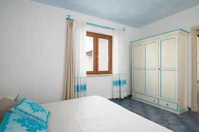Letto o letti in una camera di Residence Solaria