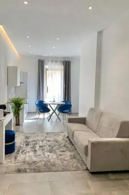 Area soggiorno di International House Apartment