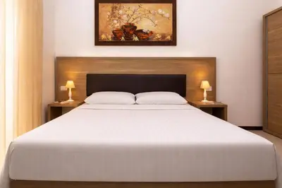 Letto o letti in una camera di Le Residenze del Centro