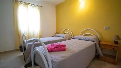 Letto o letti in una camera di Villetta Marina