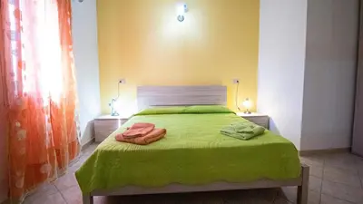 Letto o letti in una camera di Villetta Marina