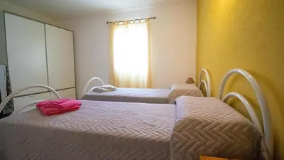 Letto o letti in una camera di Villetta Marina