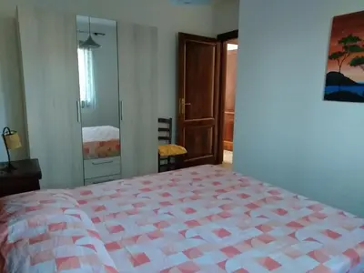 Letto o letti in una camera di Sa Pira