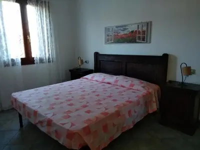 Letto o letti in una camera di Sa Pira