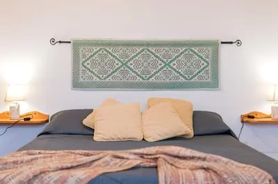 Letto o letti in una camera di S'Ulumu