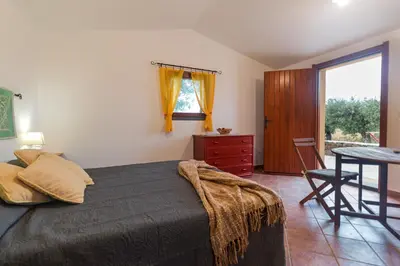 Letto o letti in una camera di S'Ulumu