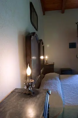 Letto o letti in una camera di Domo Minnannu Miriu
